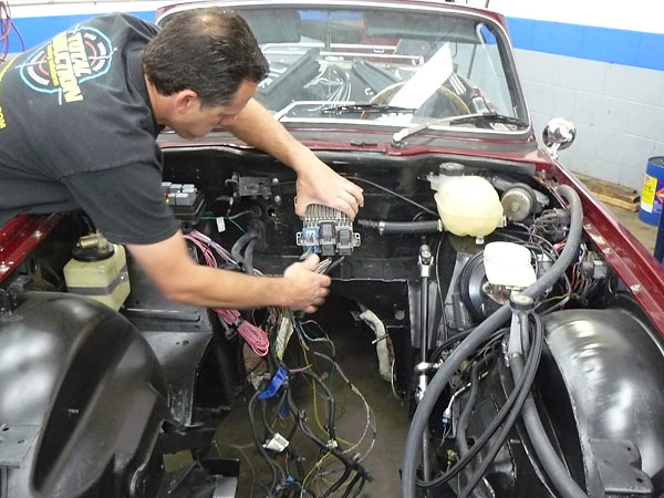 Paul wiring the engine bay.