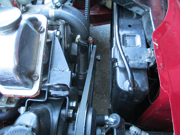 Electric water pump is mounted below this stock power steering pump.