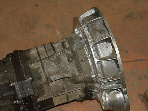 Bellhousing contructed by marrying cut-down Triumph and Toyota parts.