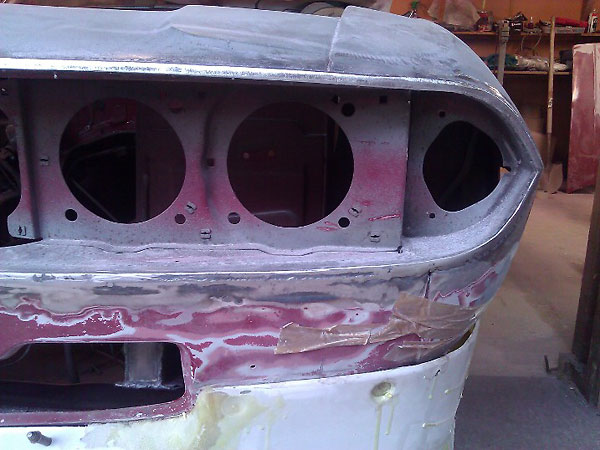 The panel beater spent a week refabricating the unit to mate with the front cowling.