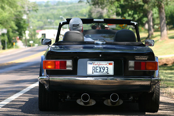 Monza 2.5-to-4 glass-pack exhaust tips.