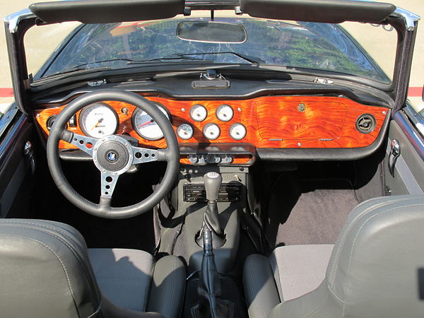 Custom dashboard made from Kewazinga African rosewood by Randy Keller of Prestige Autowood.