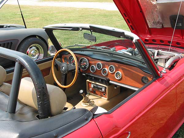 Custom TR6 dashboard and radio console.