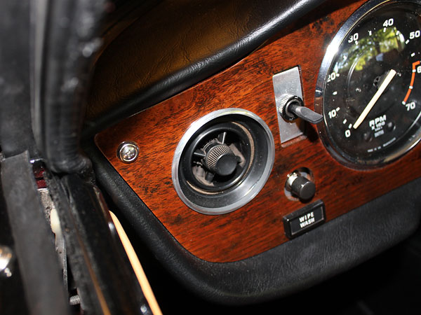 Custom turned/polished stepped aluminum rings fit dashboard cooling vent openings.