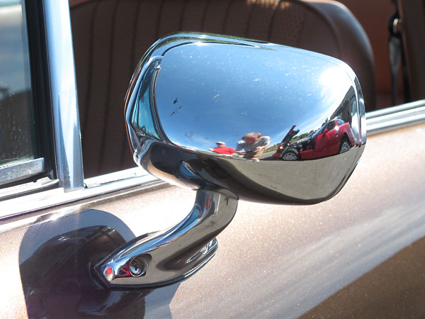 Triumph Stag side view mirror.