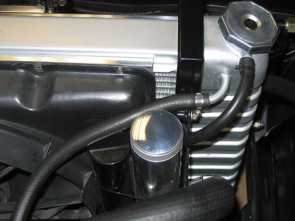 4-row crossflow radiator from 1969 Firebird. Chrysler minivan fan and shroud.