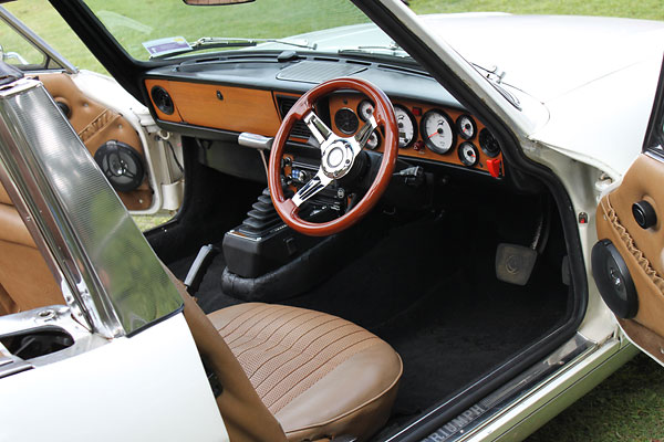 Mostly stock interior, but with Alpine stereo system.