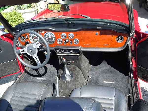 Red button on shifter knob controls a linelock (hydraulic brake lockout valve).