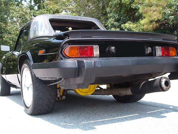 Ford rear spoiler. Supertrapp muffler.