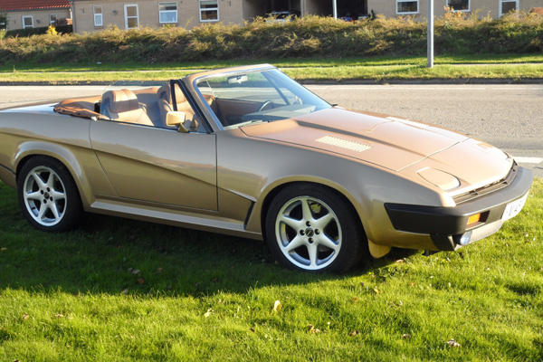 Champagne metallic Triumph TR8.