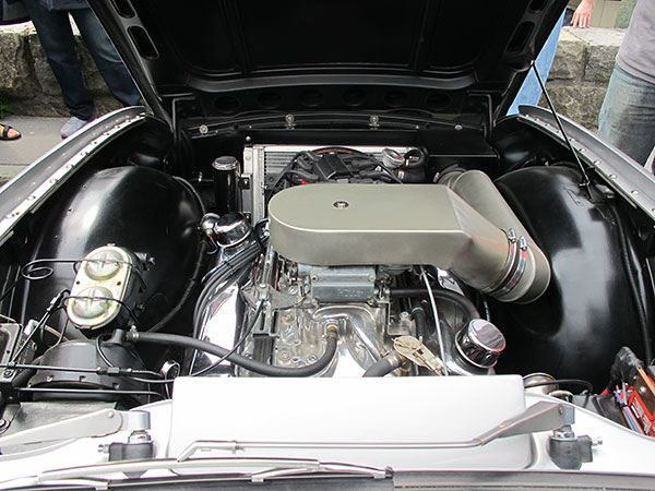 Brake vacuum booster plumbed to the engine's intake manifold.